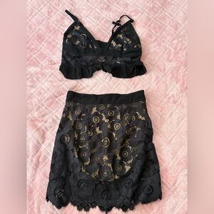 For love and lemons set 2 pc 

Black lace ; skirt has built in bottoms s